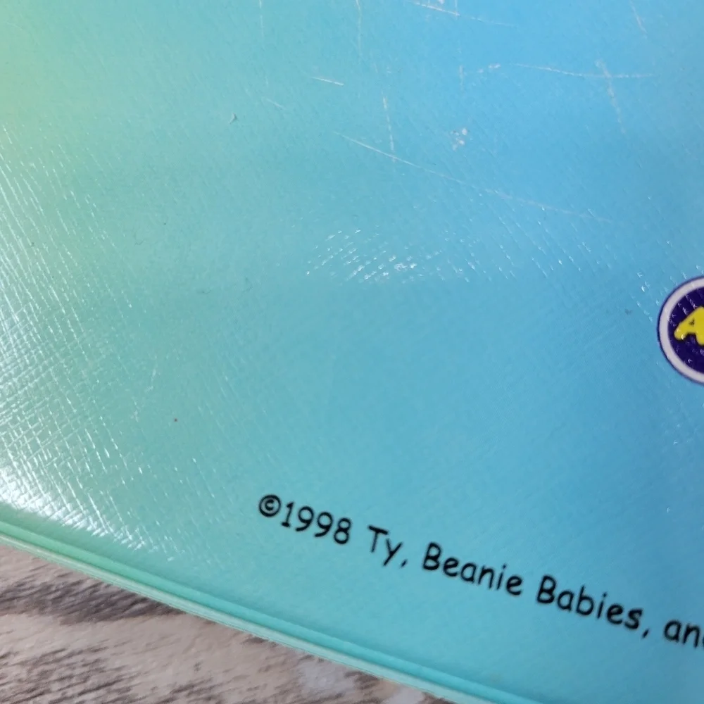 Vintage 1998 Beanie Babies card binder with 49 cards yellow
